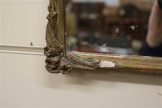 A shell applied wall mirror and a fern moulded gilt framed mirror W.56cm and 35cm